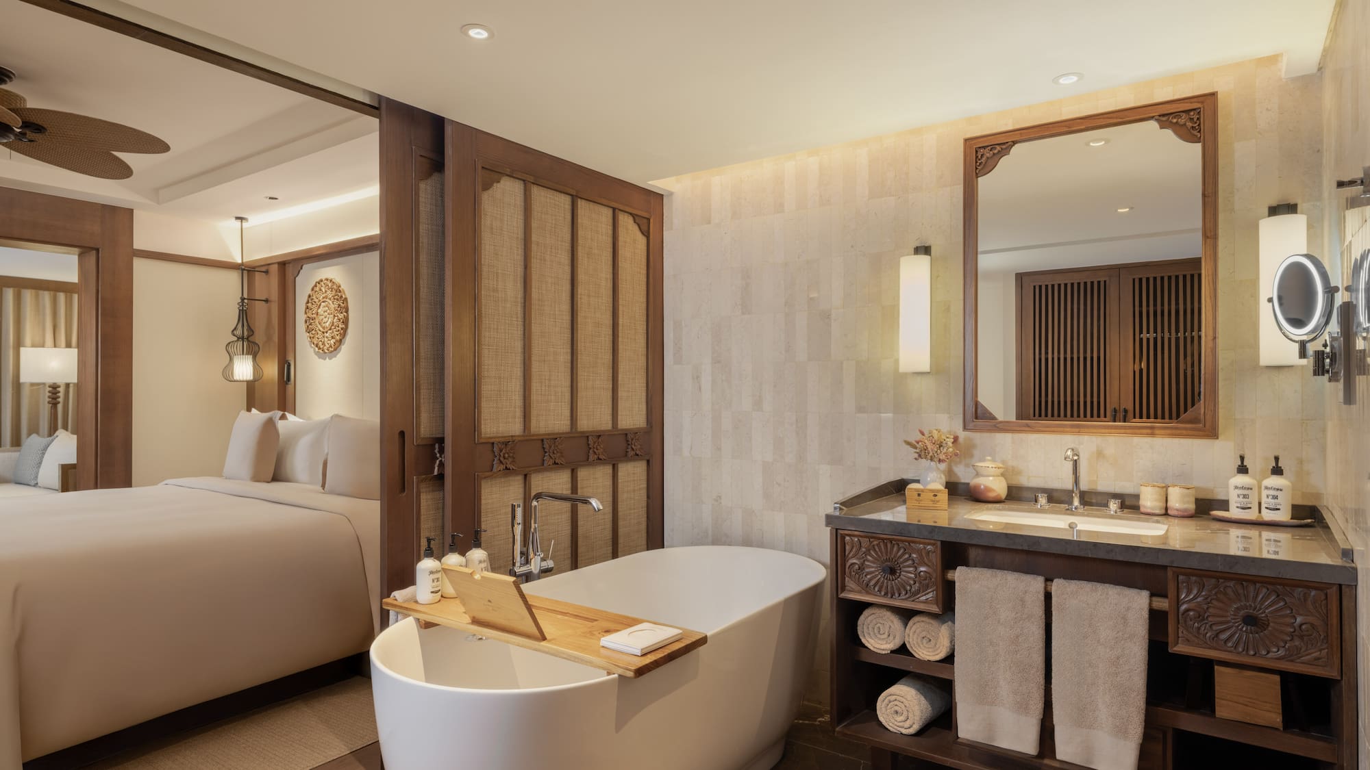 a bathroom with a bathtub and a mirror