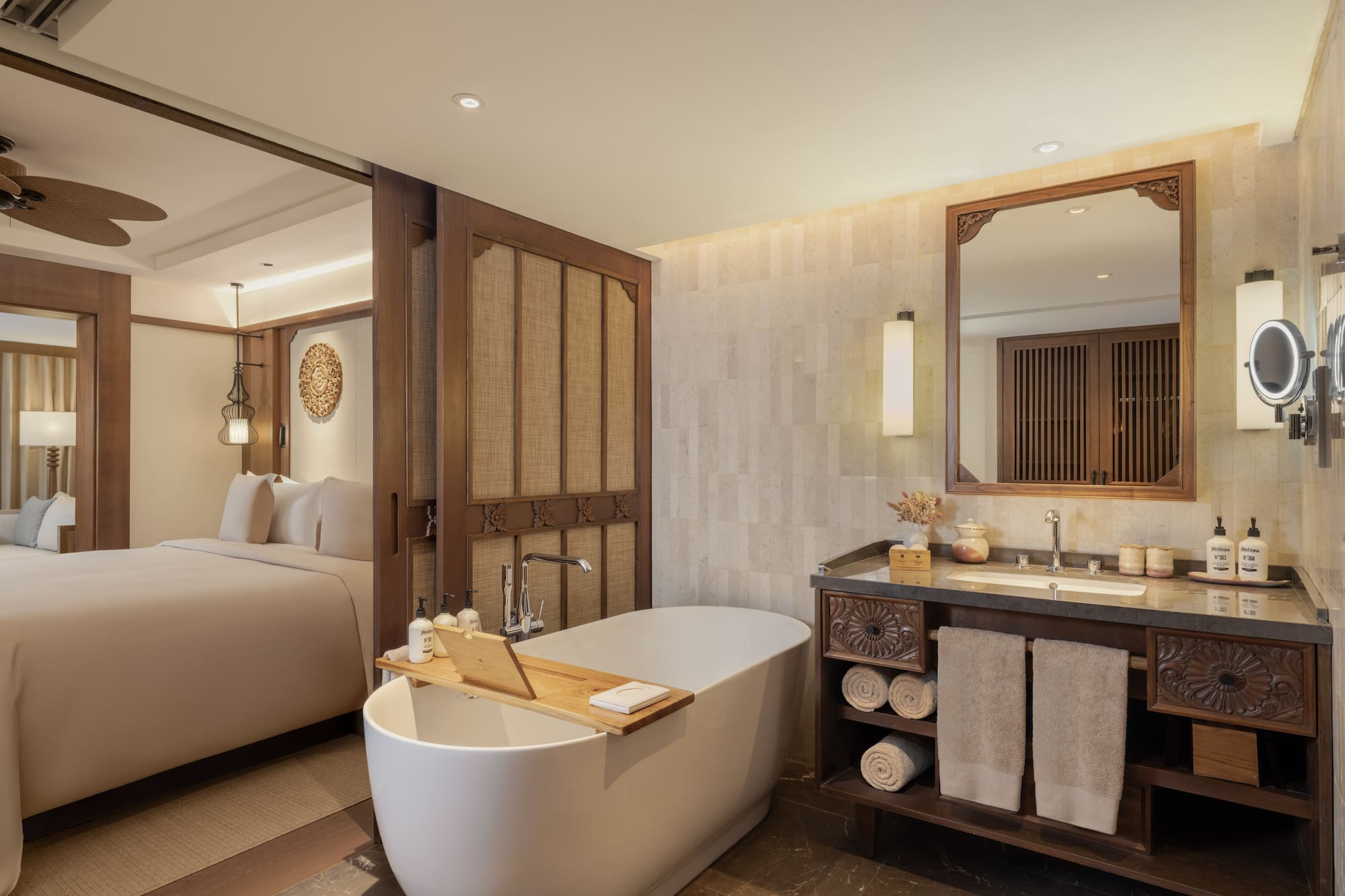 a bathroom with a bathtub and a mirror