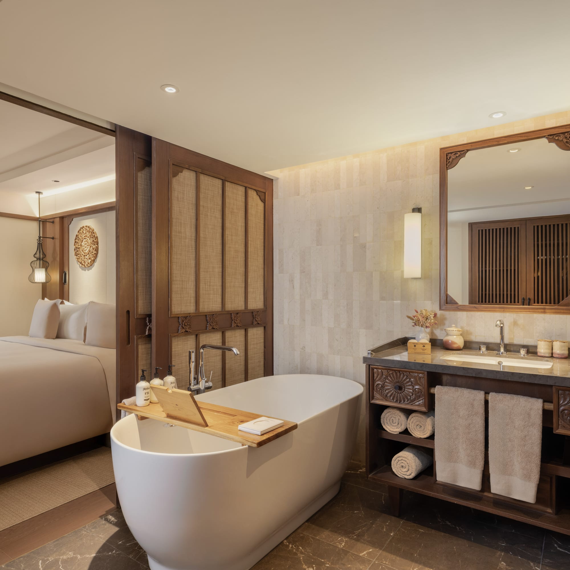 a bathroom with a bathtub and a mirror