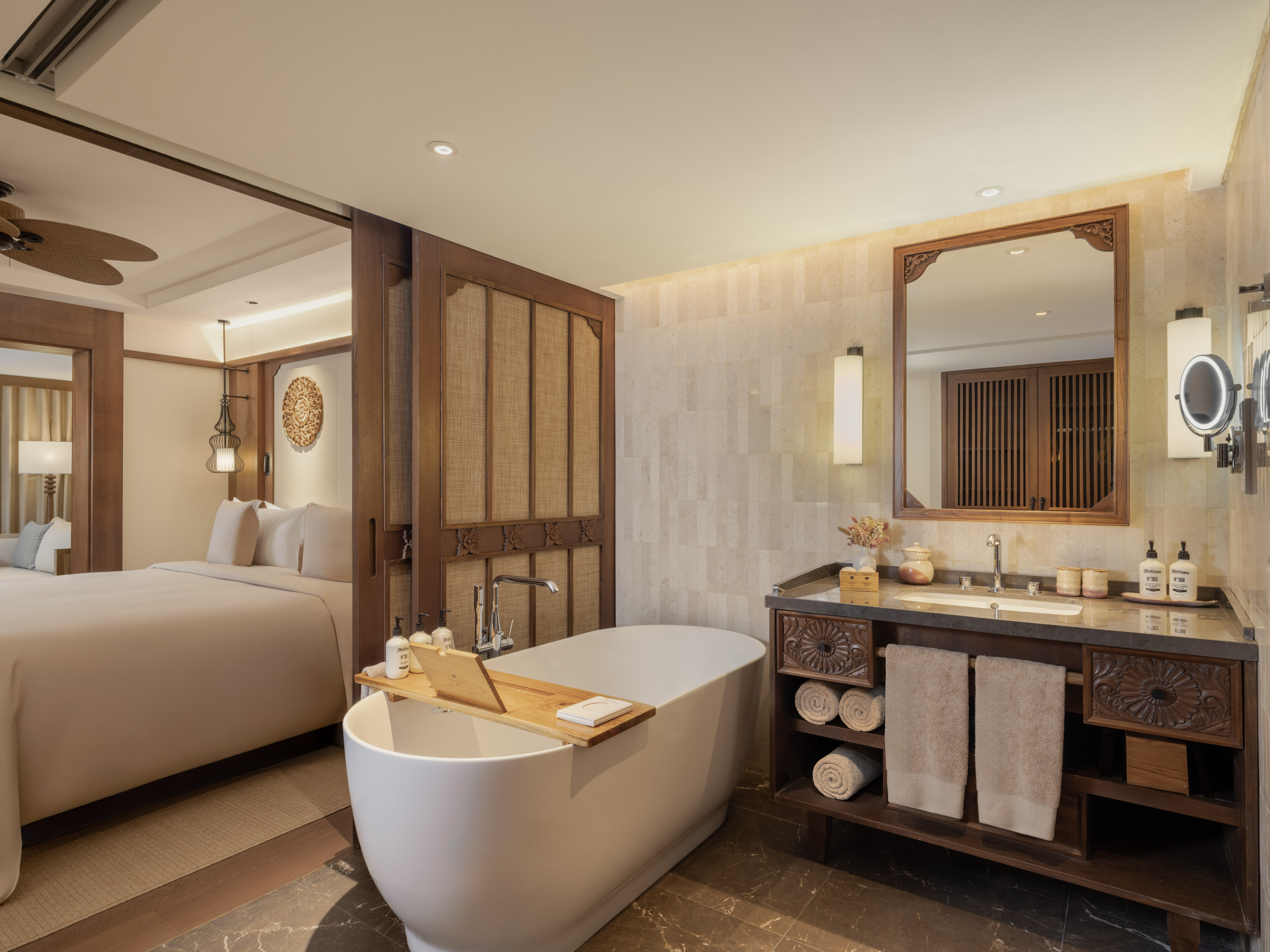 a bathroom with a bathtub and a mirror