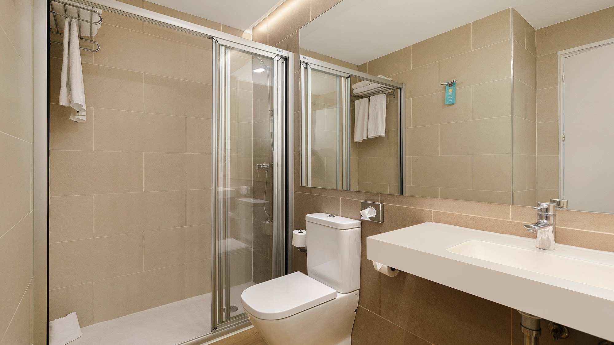 a bathroom with a shower and toilet