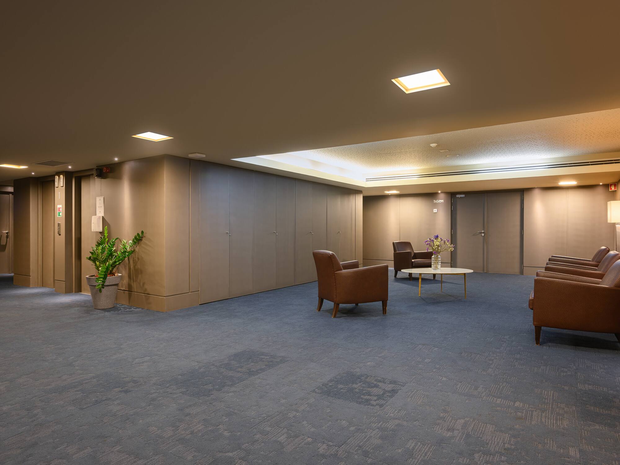 a room with chairs and a table