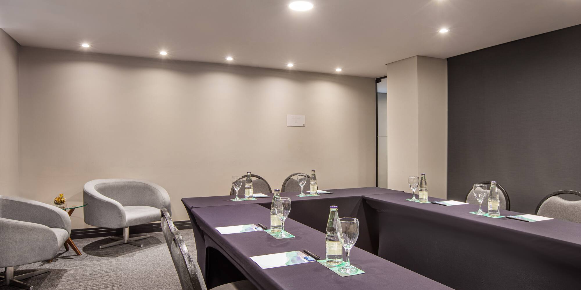 a room with tables and chairs