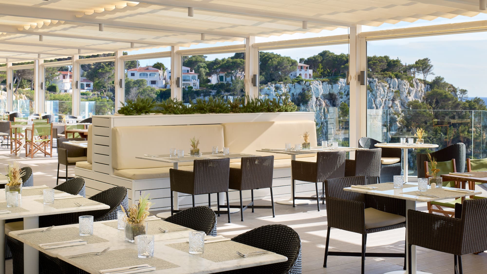 a restaurant with tables and chairs