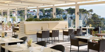 a restaurant with tables and chairs