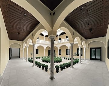 a courtyard with plants in it