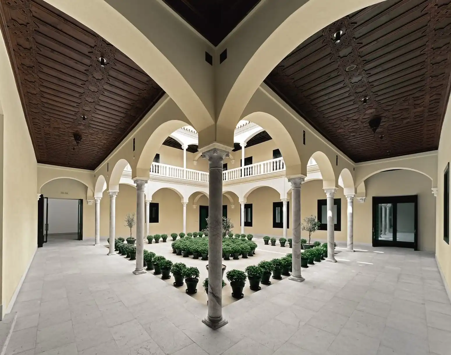 a courtyard with plants in it