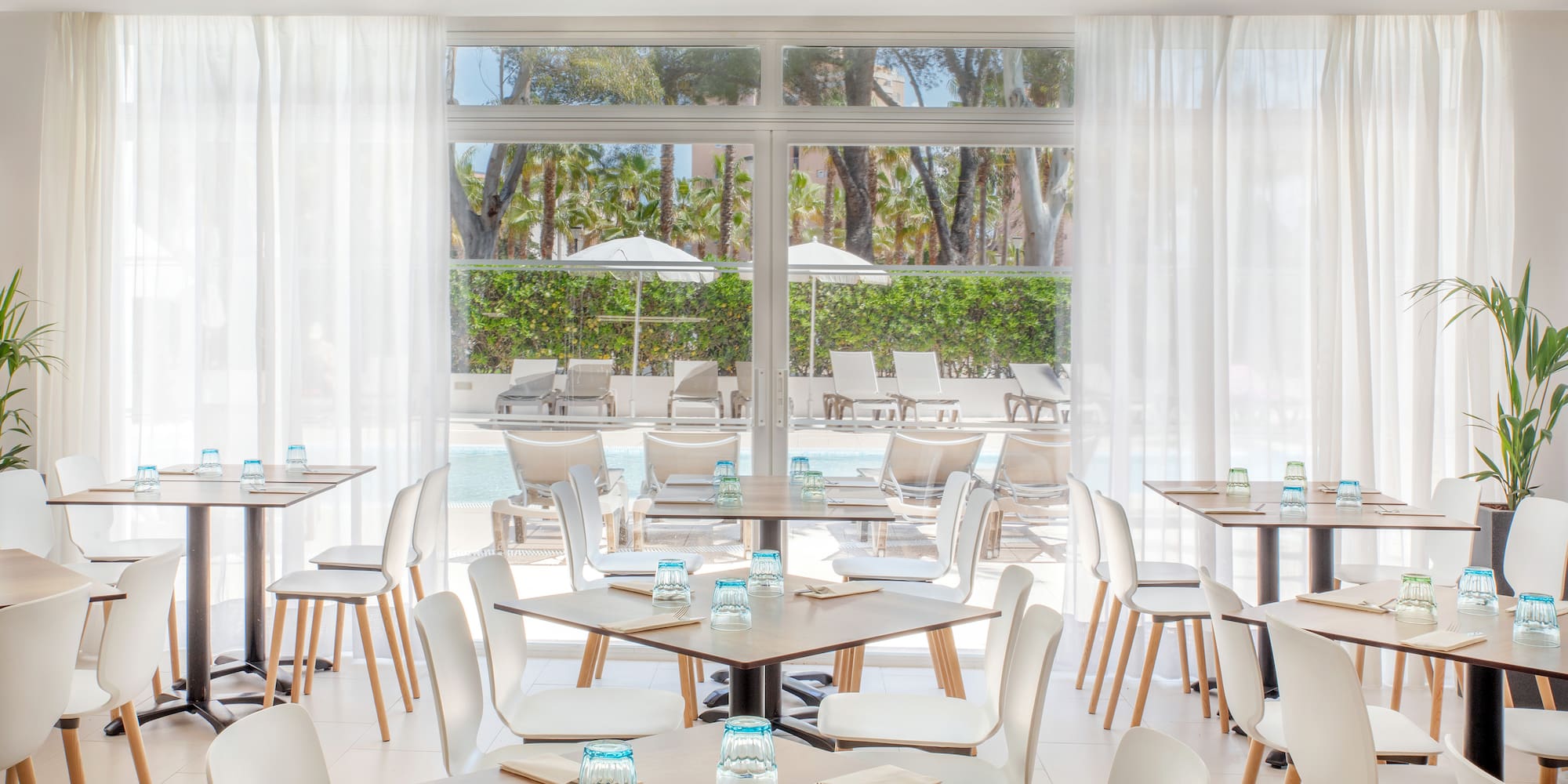 a room with tables and chairs