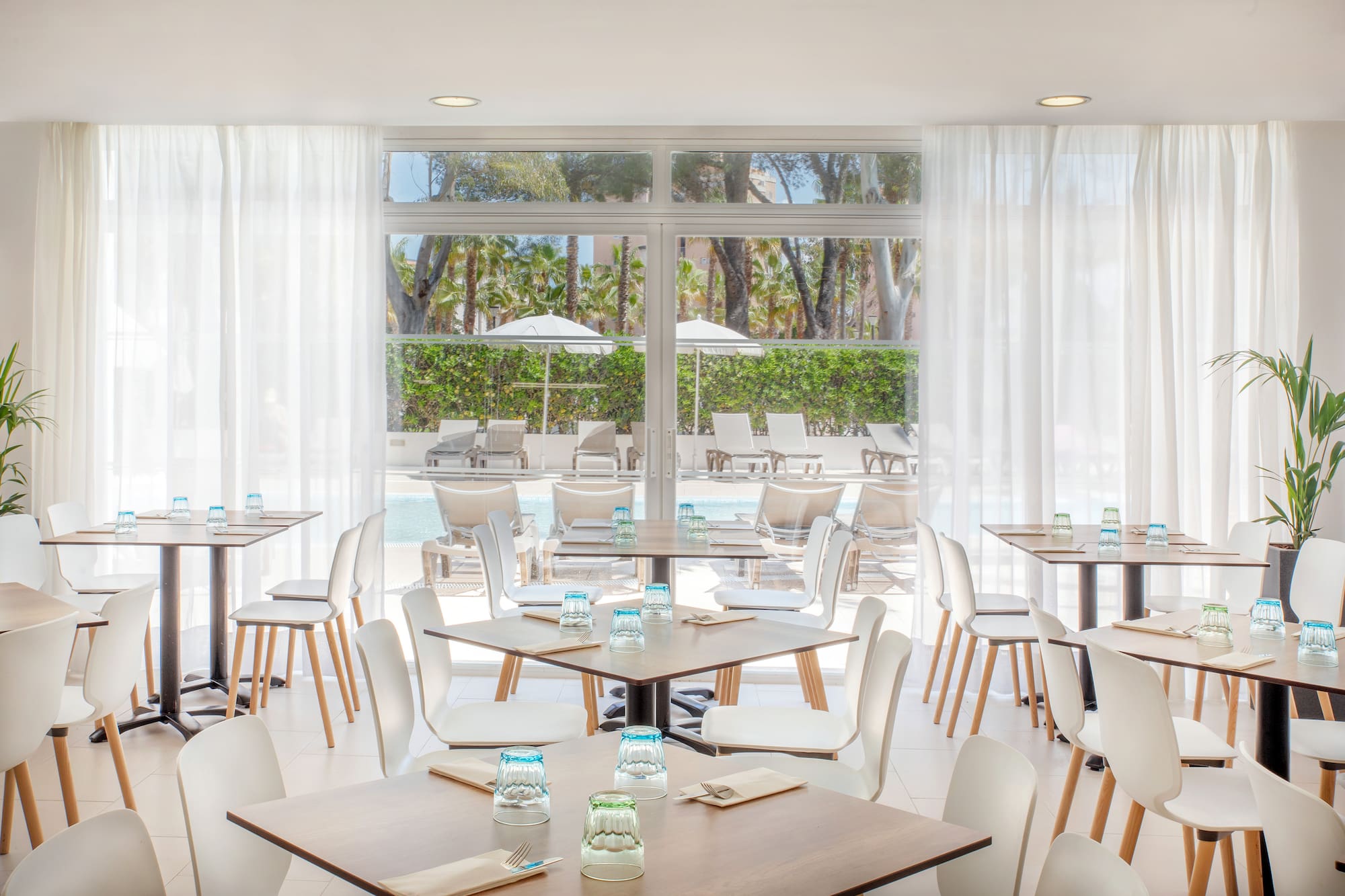 a room with tables and chairs