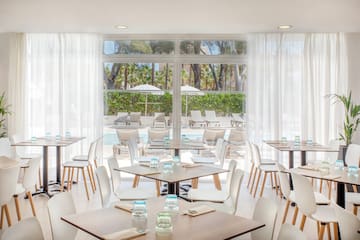 a room with tables and chairs