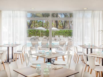 a room with tables and chairs