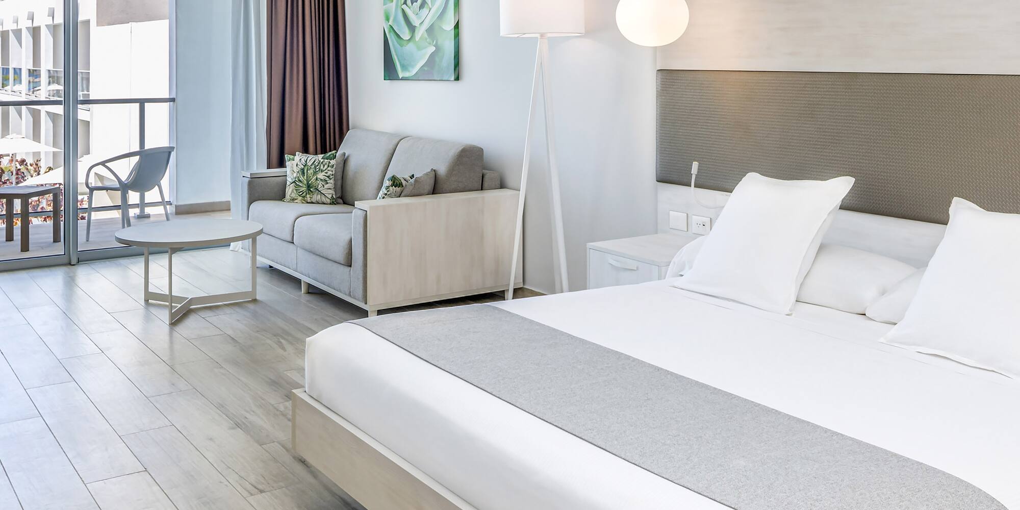 a room with a bed and a couch