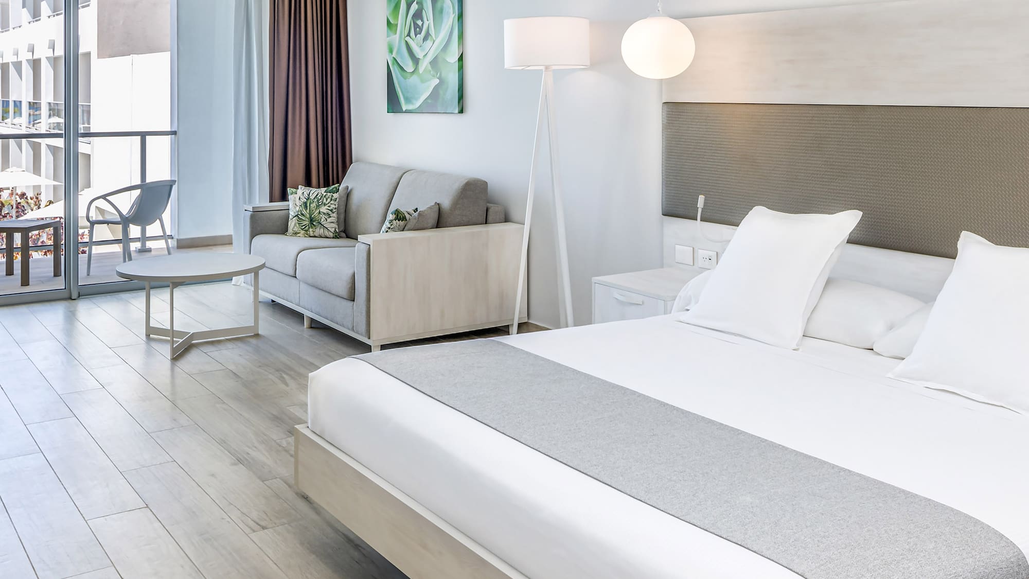 a room with a bed and a couch