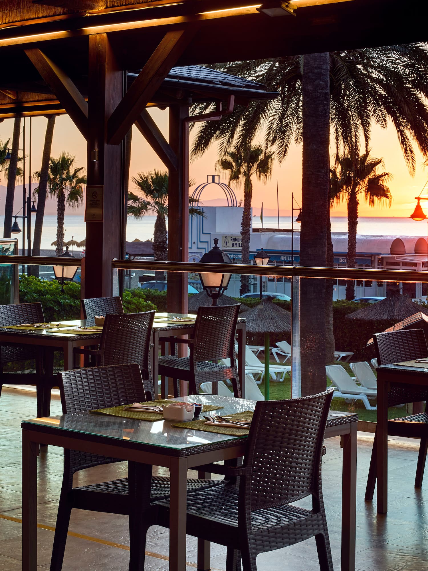 a restaurant with tables and chairs