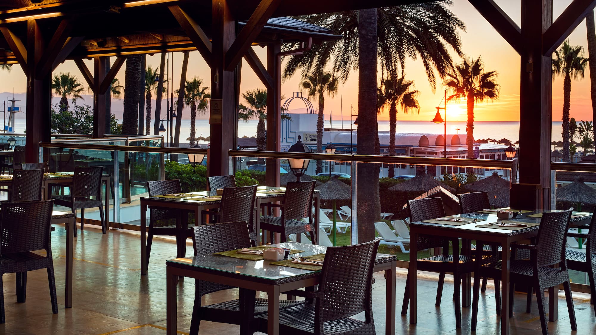 a restaurant with tables and chairs