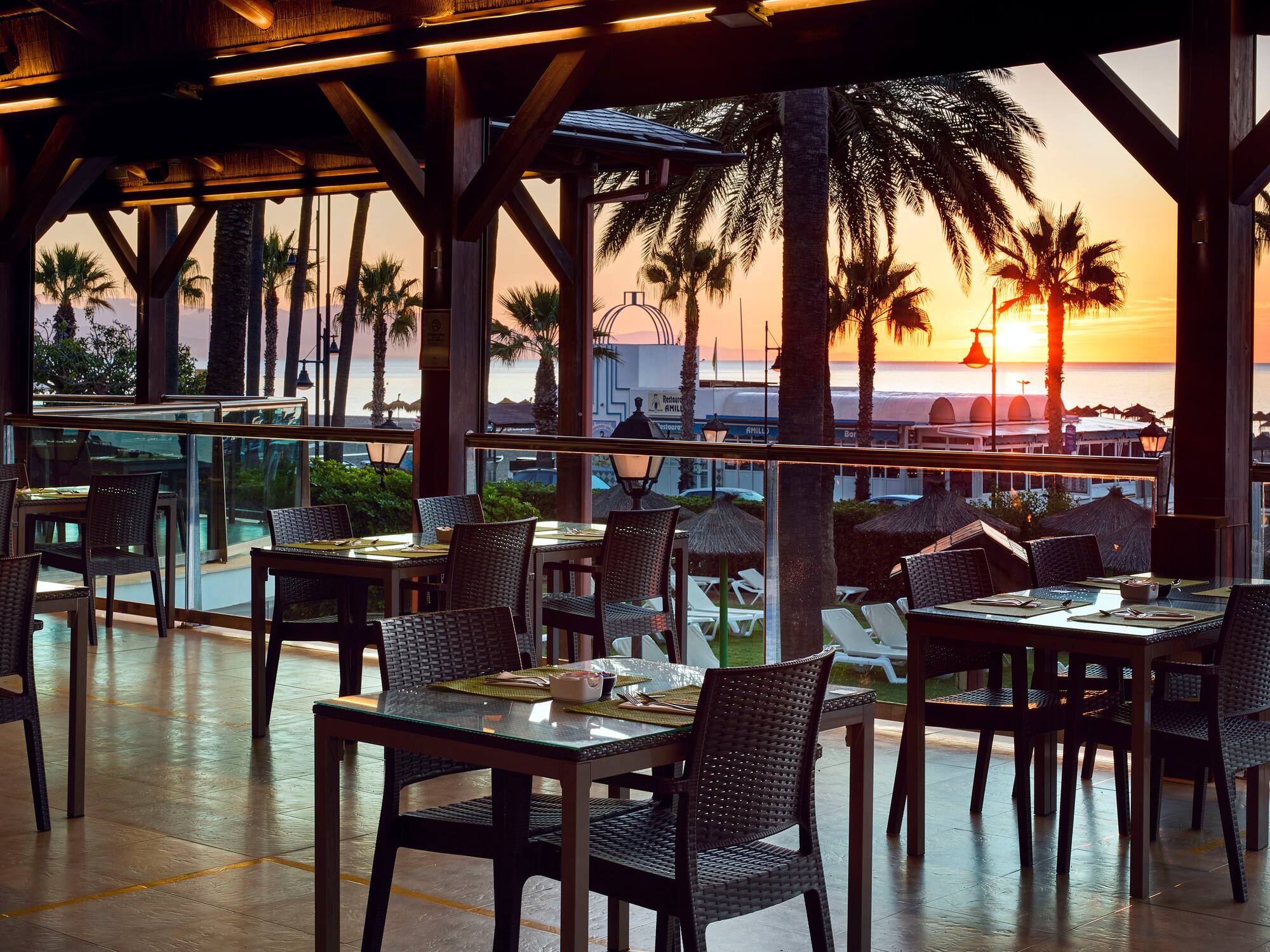 a restaurant with tables and chairs