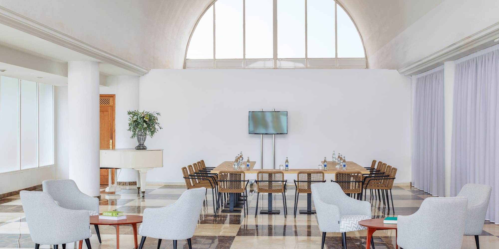 a room with a table and chairs