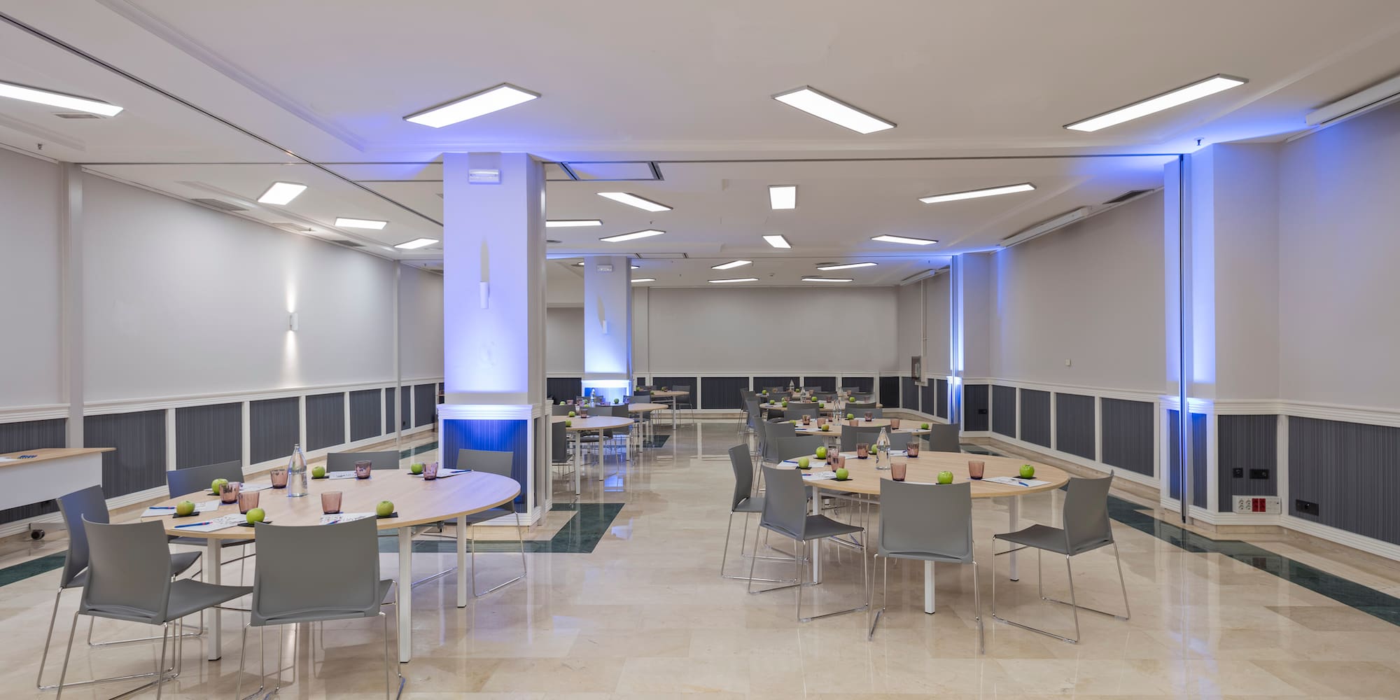 a room with tables and chairs