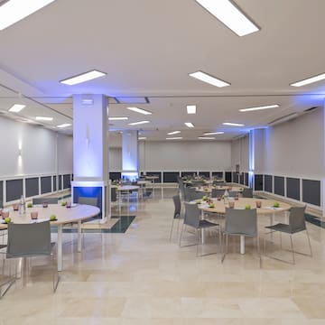 a room with tables and chairs