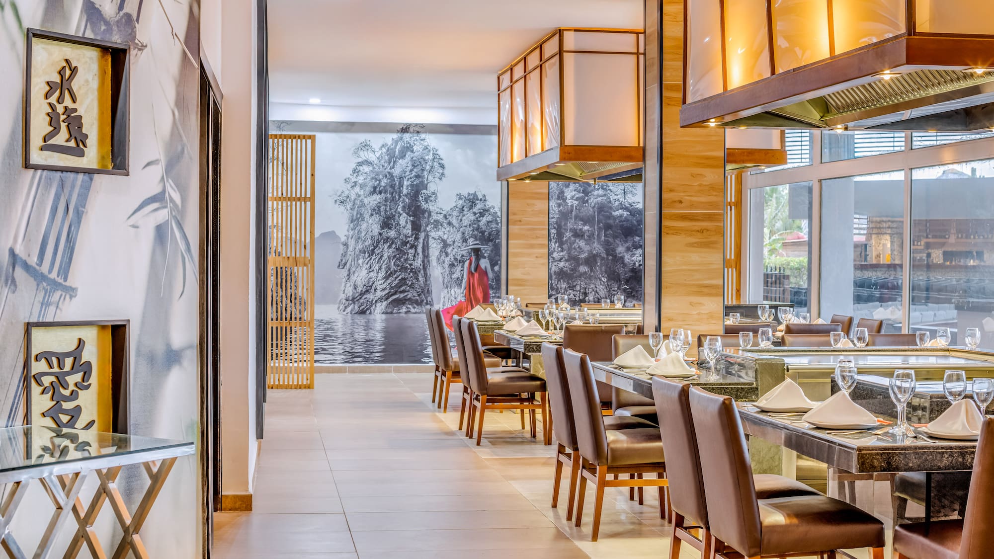 a restaurant with tables and chairs