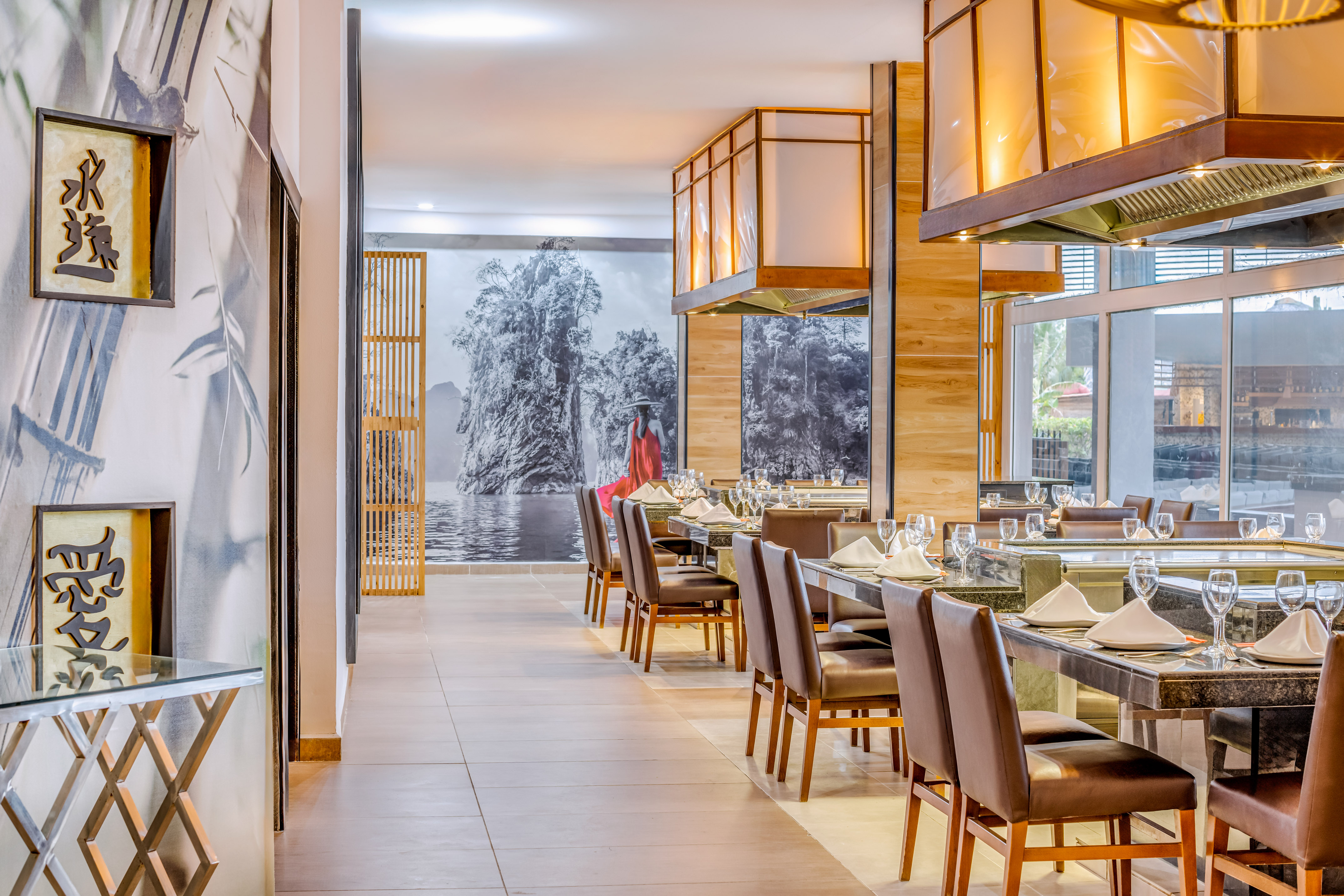 a restaurant with tables and chairs