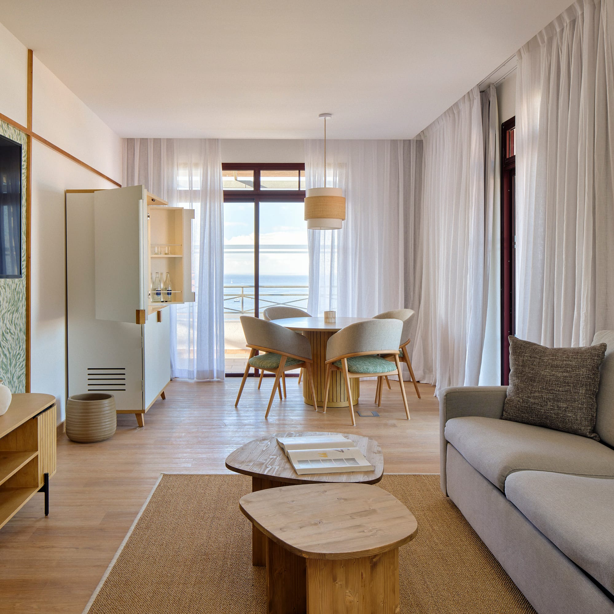 a living room with a couch and a table