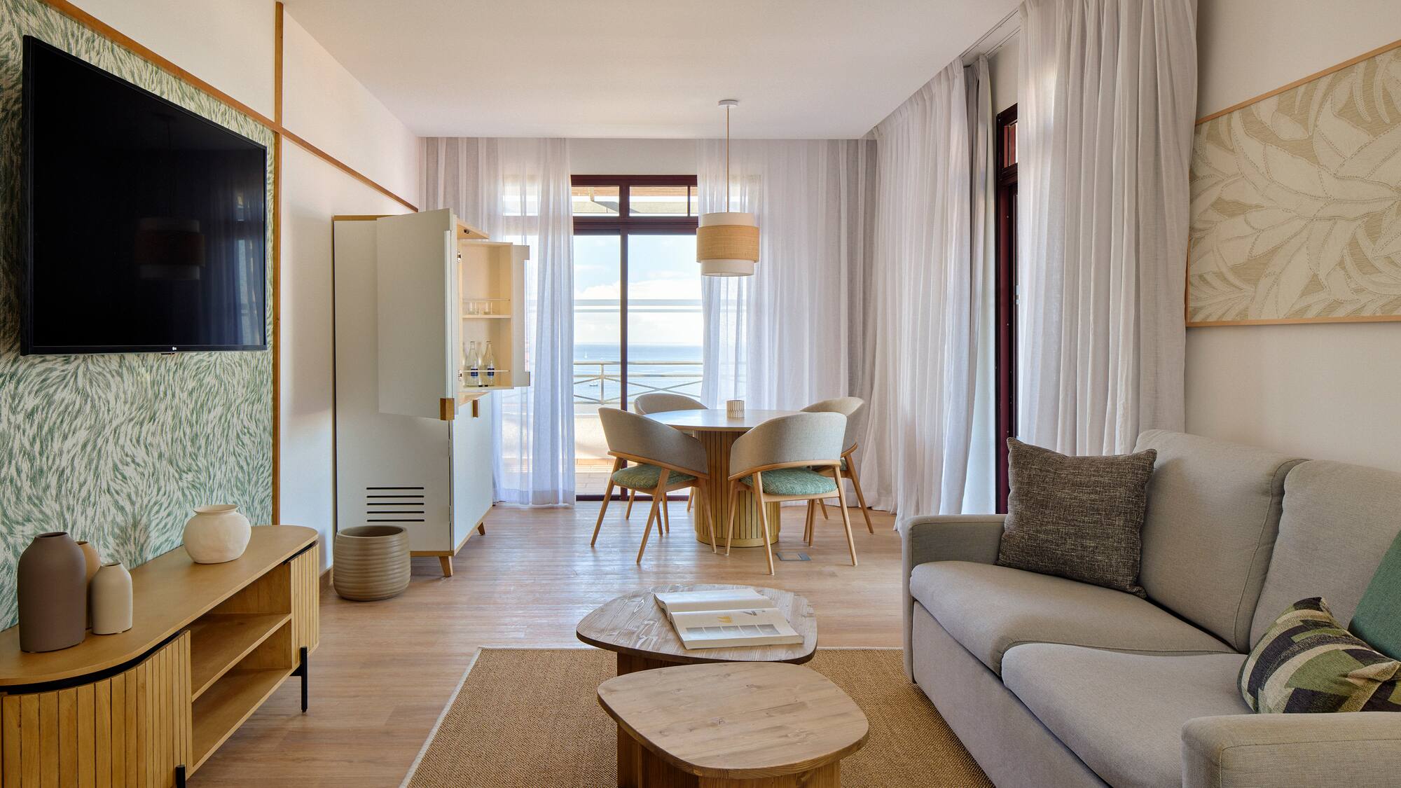 a living room with a couch and a table