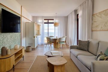 a living room with a couch and a table