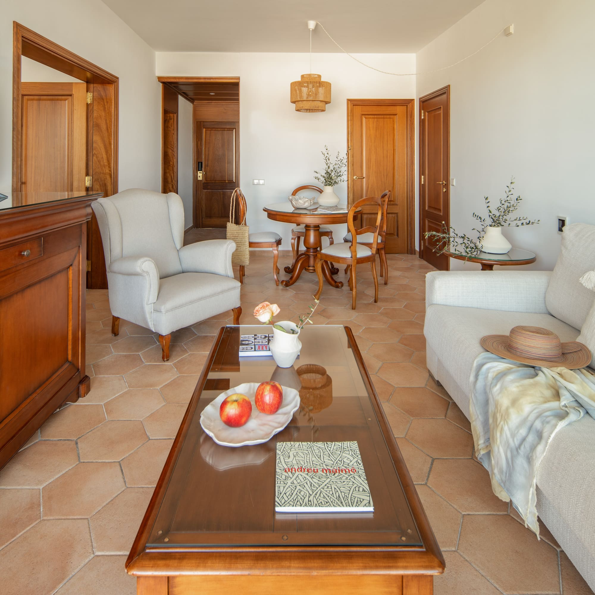 a living room with a coffee table and furniture