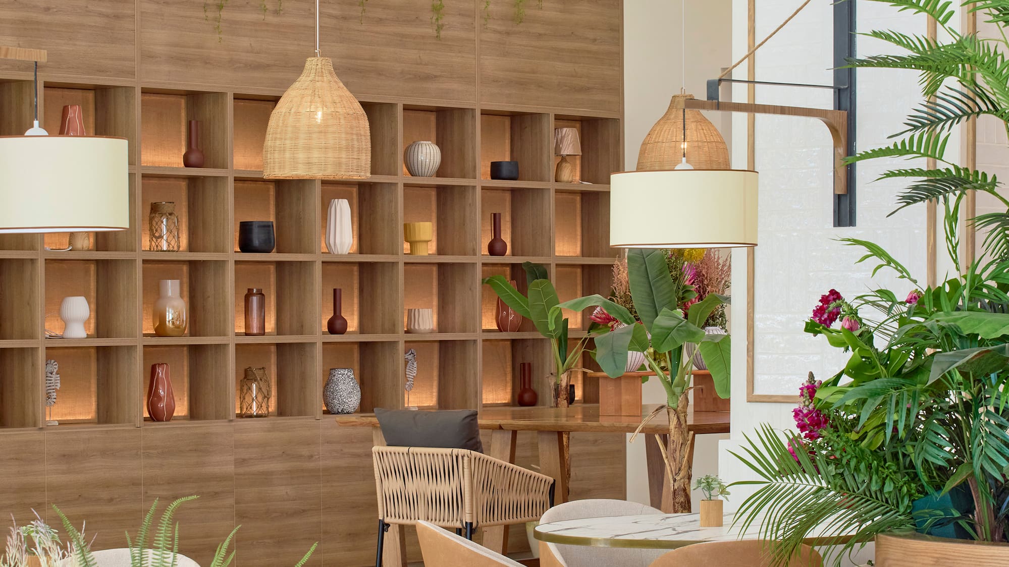 a room with plants and a table