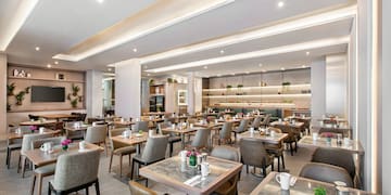 a room with tables and chairs