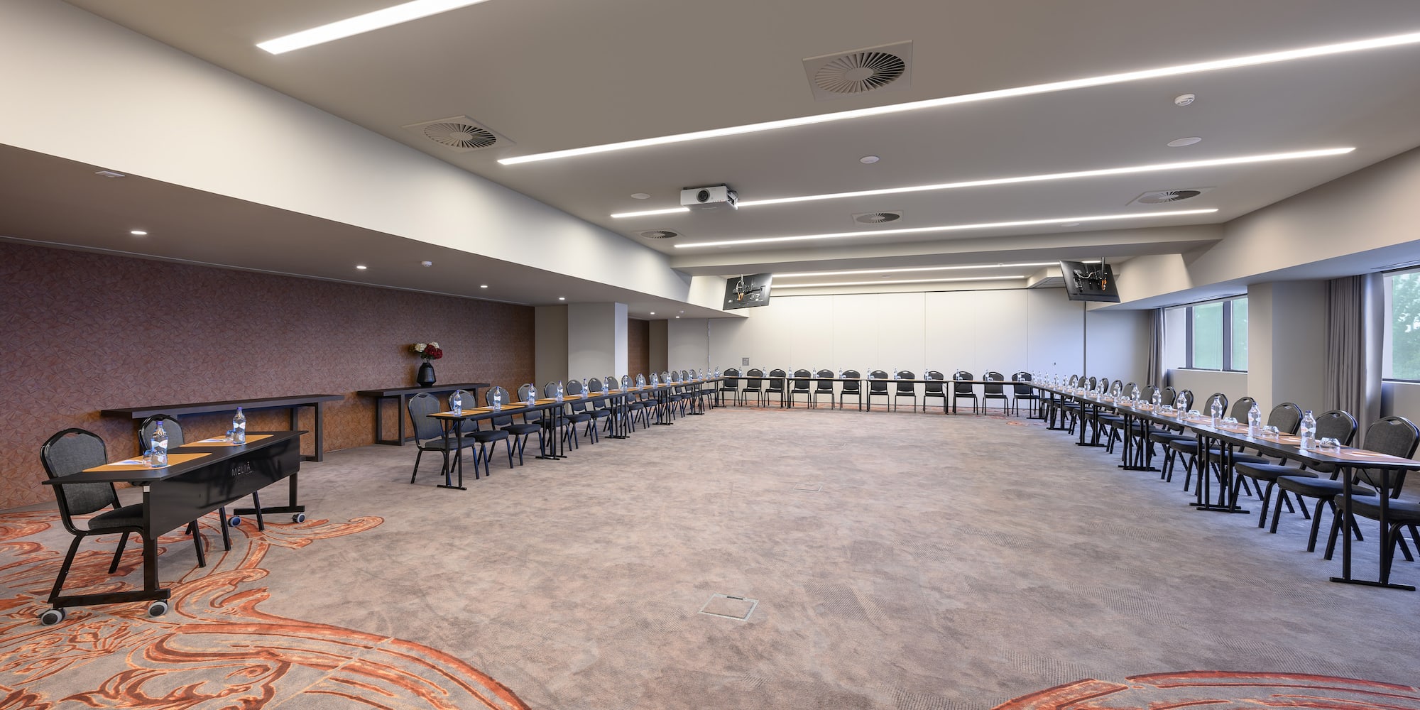 a large room with tables and chairs