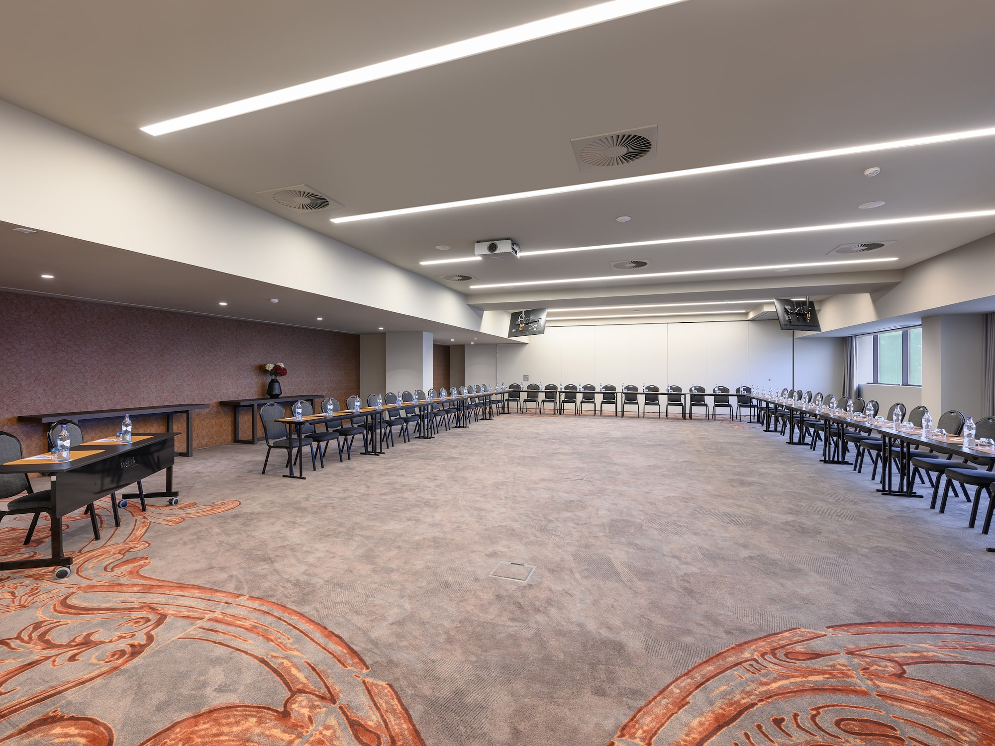 a large room with tables and chairs