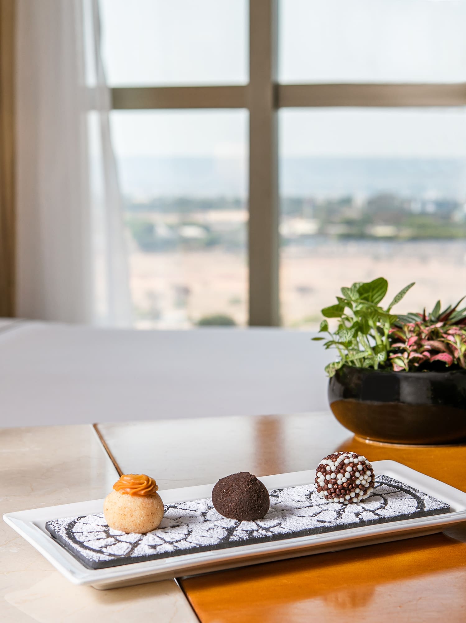 a plate of desserts on a table