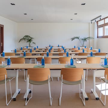 a room with tables and chairs