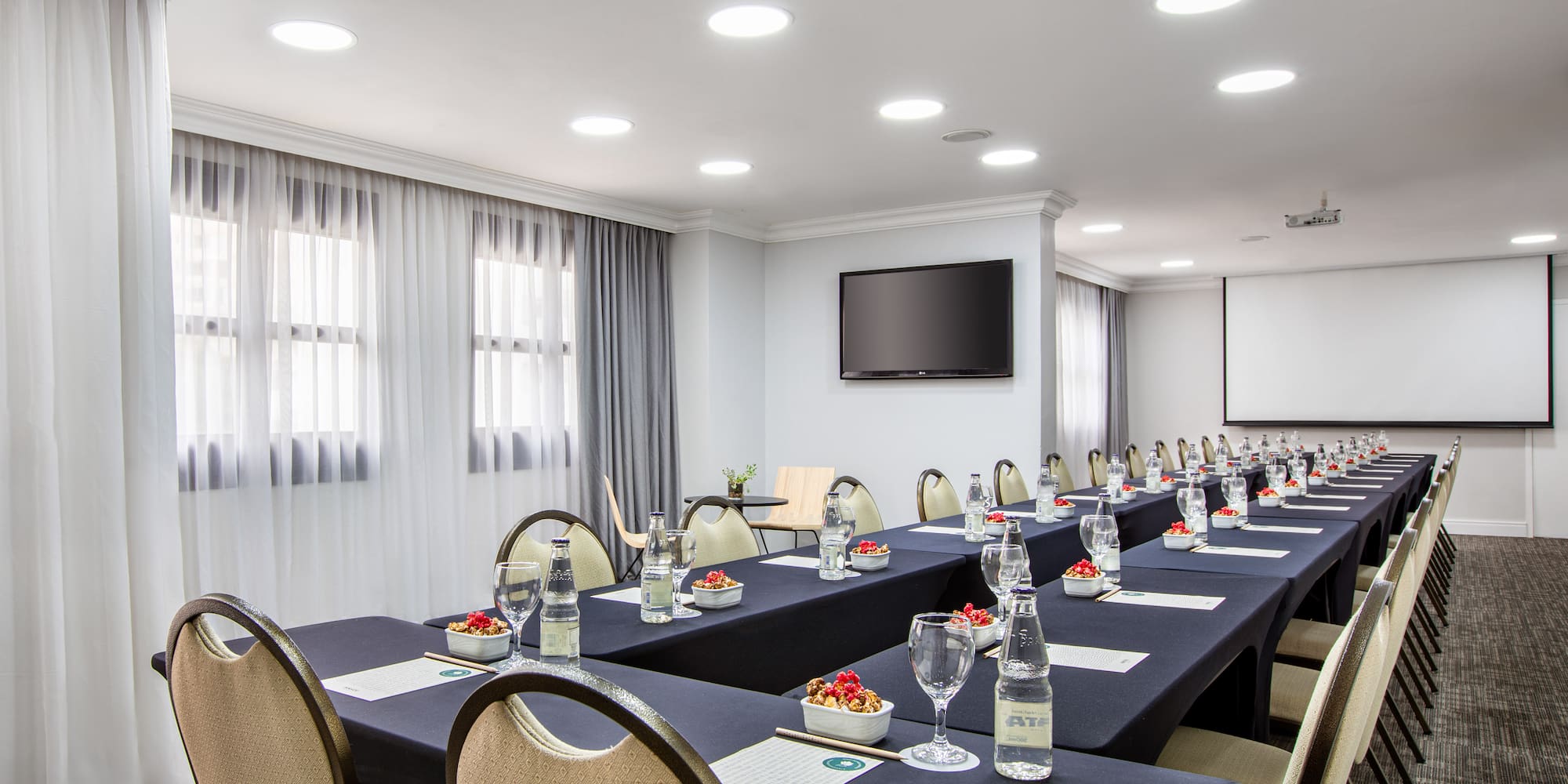 a room with tables and chairs