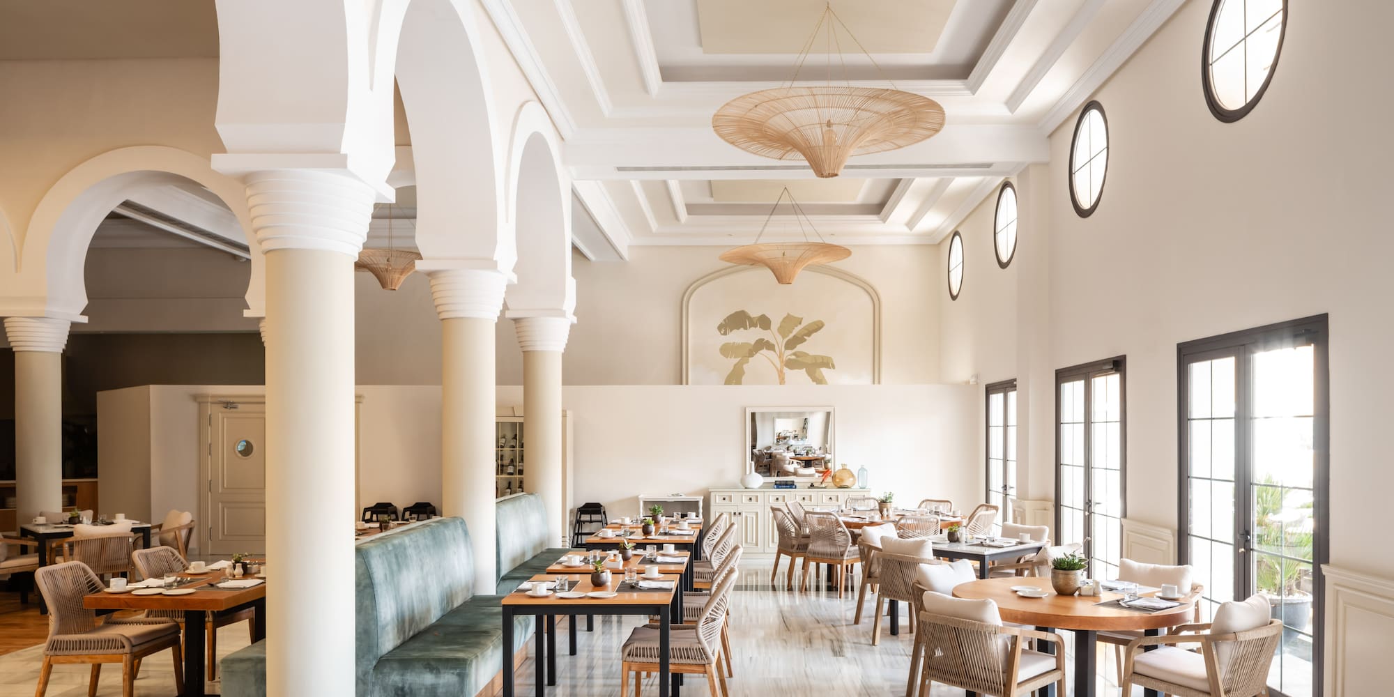 a restaurant with tables and chairs