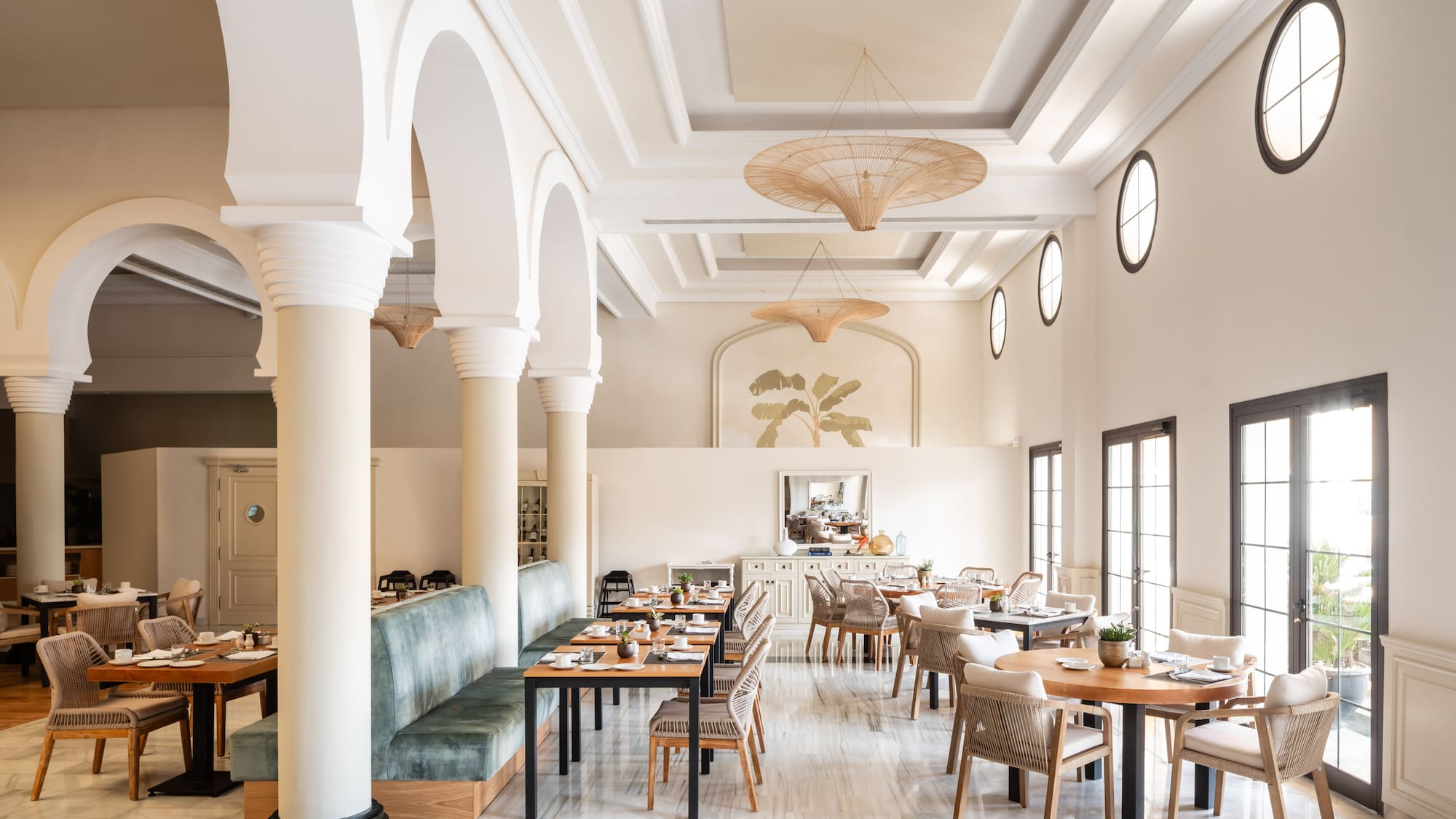 a restaurant with tables and chairs