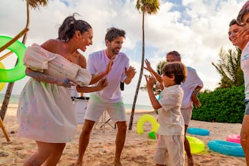 a group of people on a beach