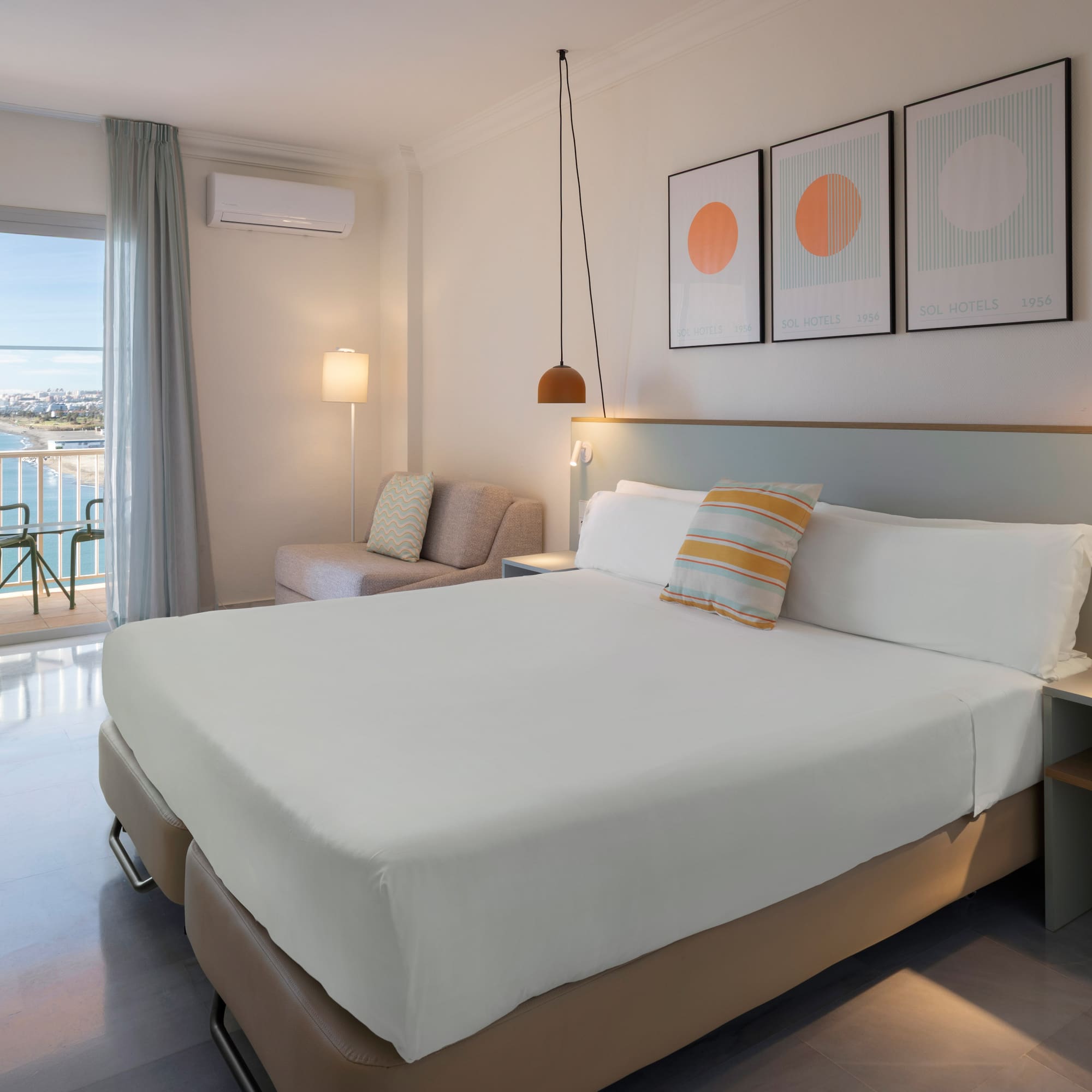 a room with a bed and a couch