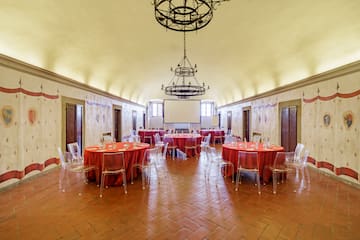 a room with tables and chairs