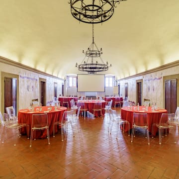 a room with tables and chairs