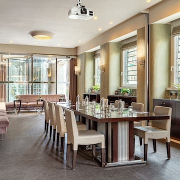 a room with a table and chairs