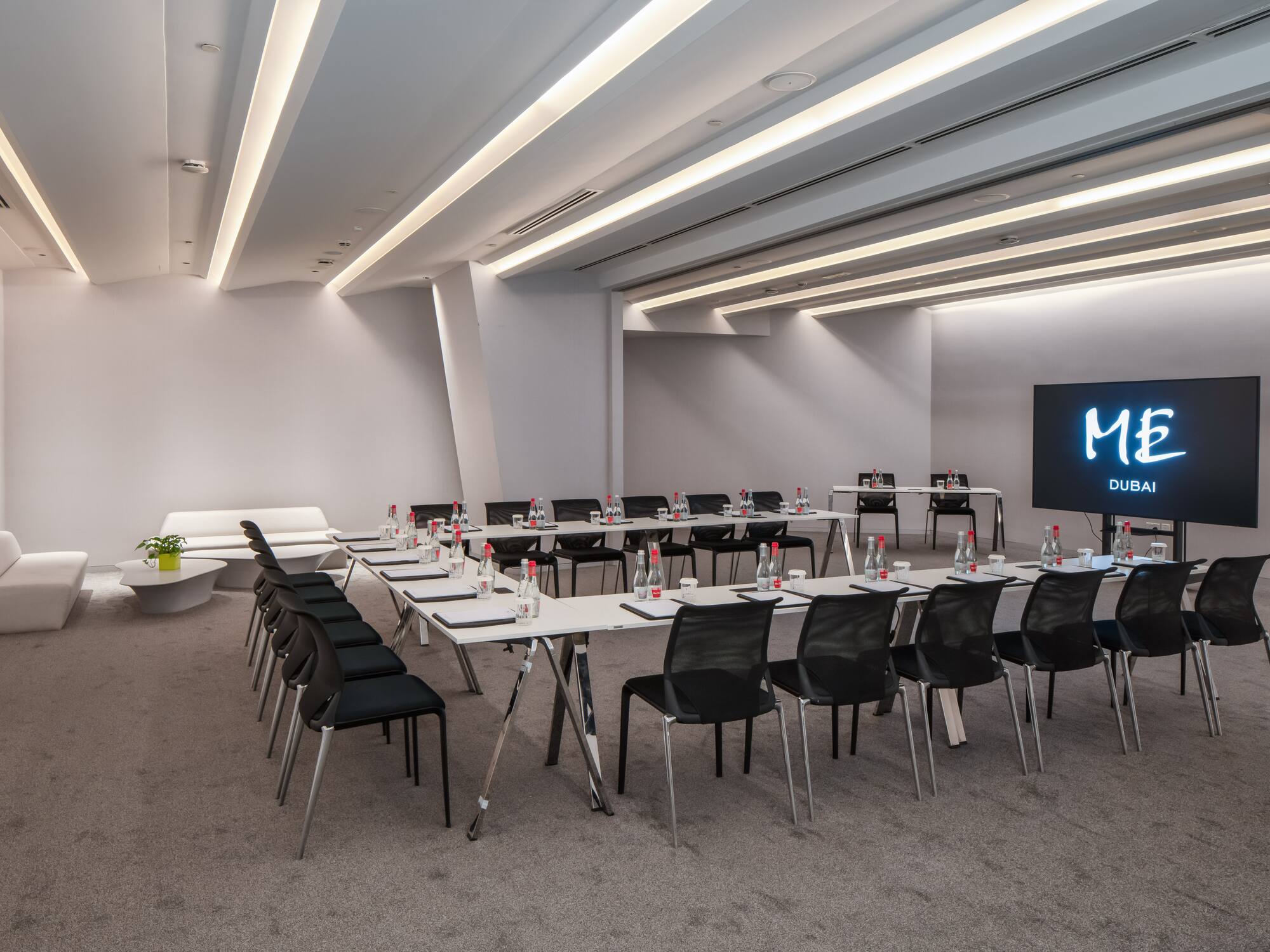 a room with tables and chairs