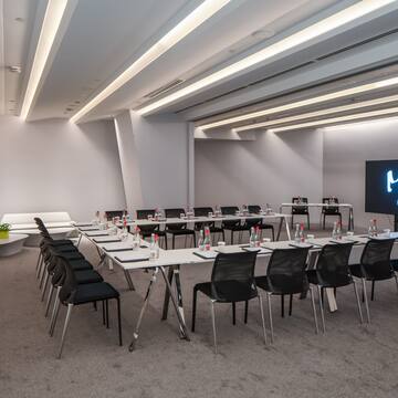a room with tables and chairs