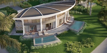 a building with a pool in the middle of it