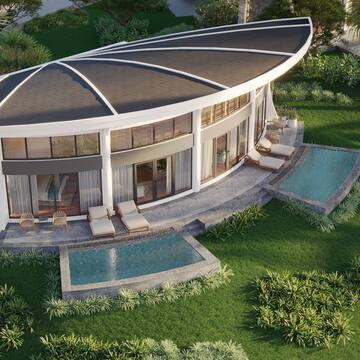 a building with a pool in the middle of it