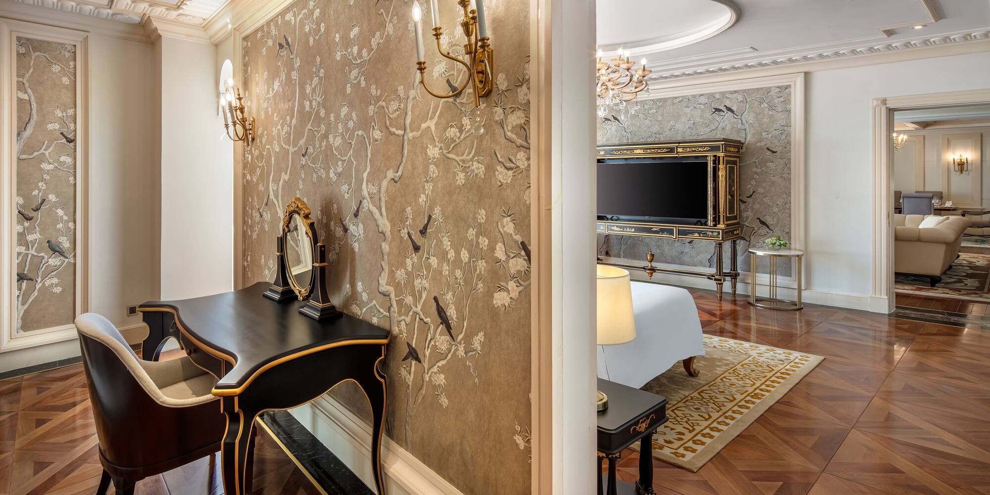 a room with a mirror and a bed