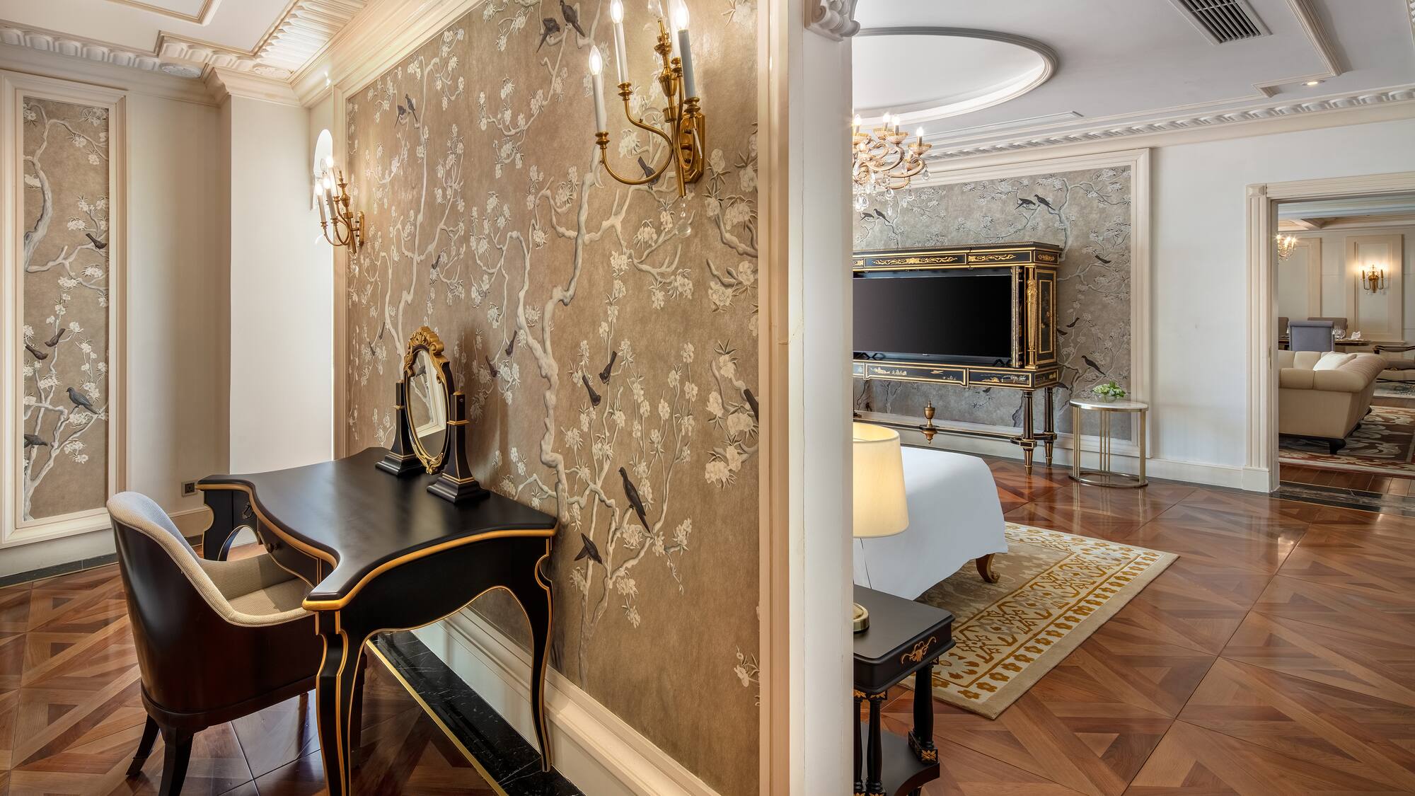 a room with a mirror and a bed