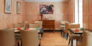 a room with tables and chairs